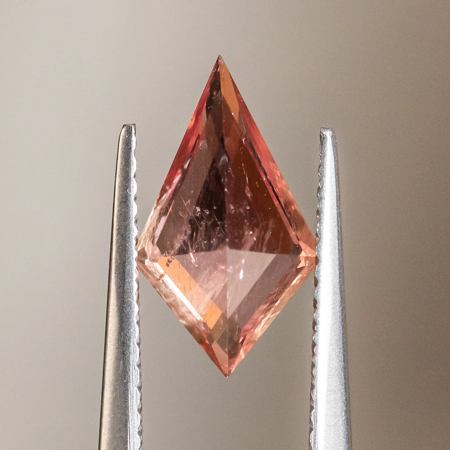 1.76CT KITE MOZAMBIQUE SAPPHIRE, ORANGE-RED, 12.4X7.3MM, UNTREATED