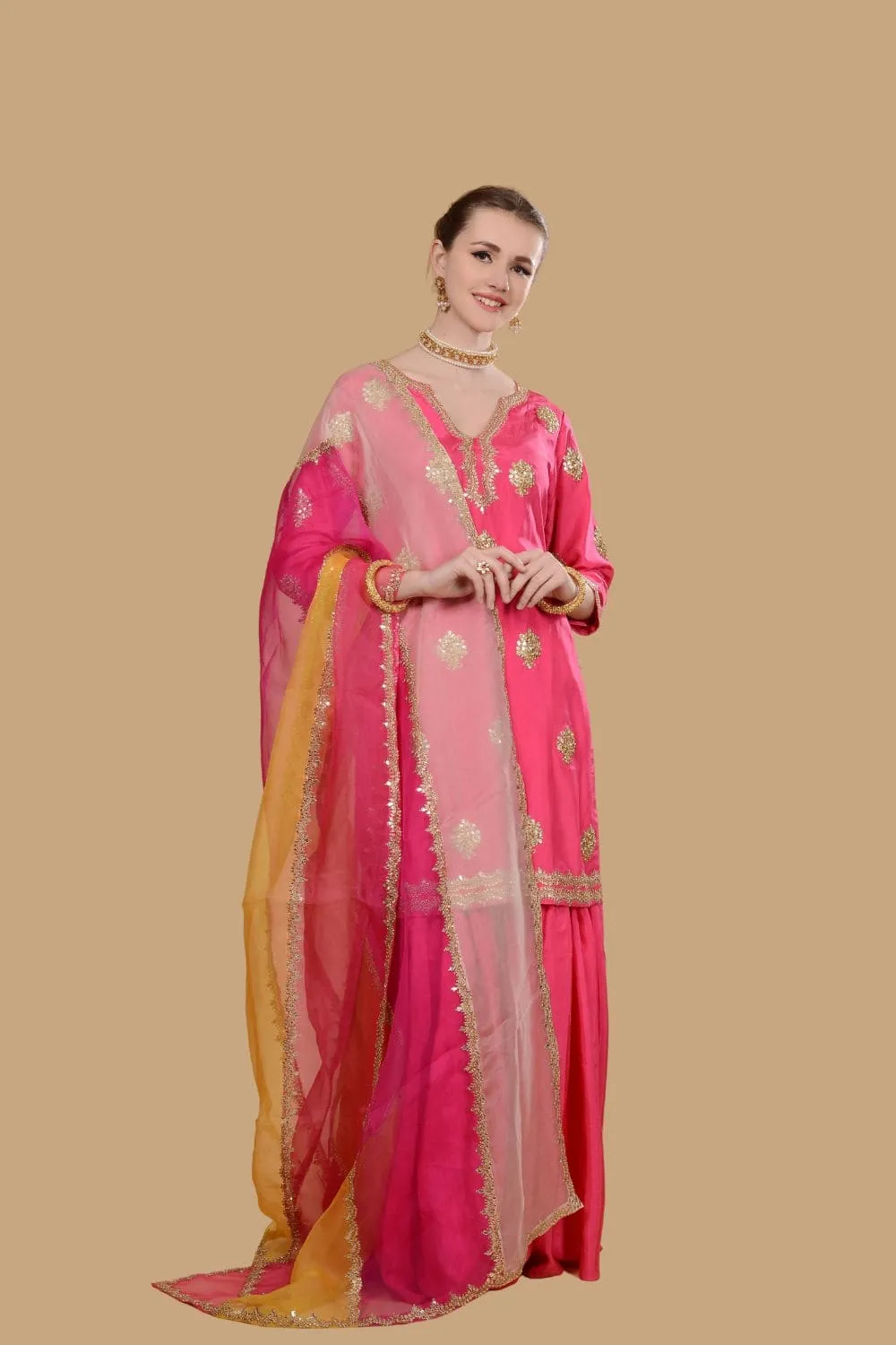 Fuchsia pink kurti and sharara set.