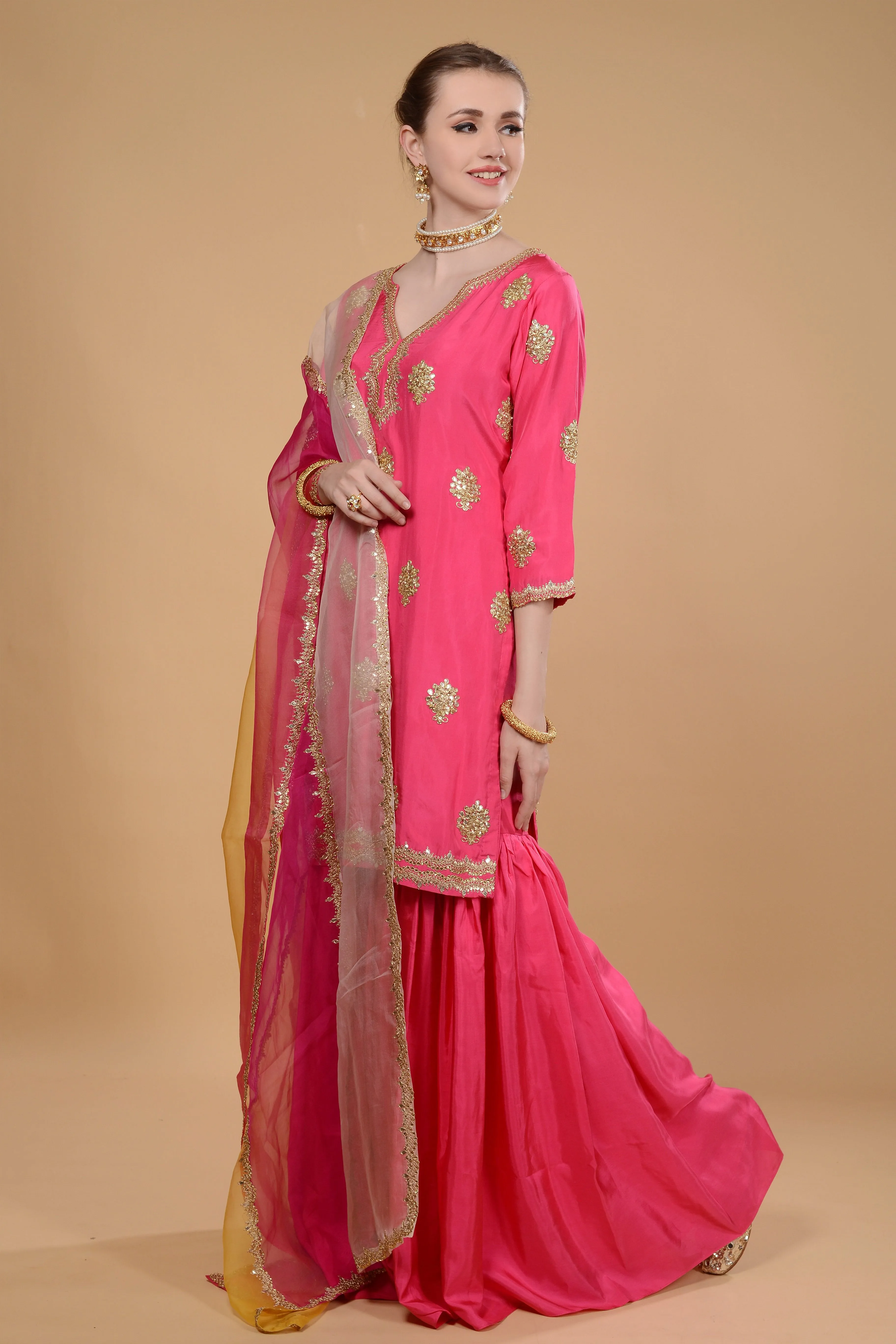 Fuchsia pink kurti and sharara set.