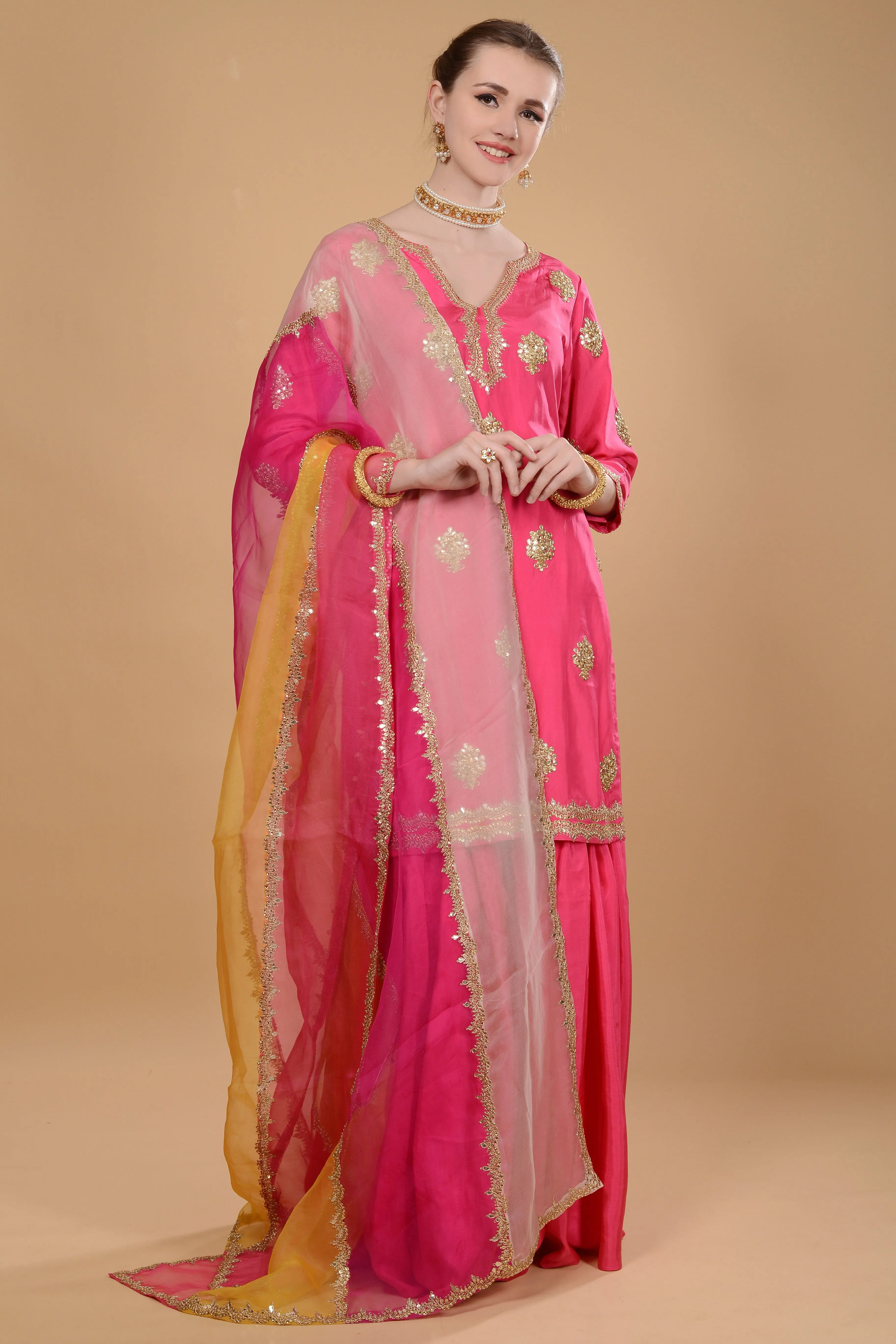 Fuchsia pink kurti and sharara set.