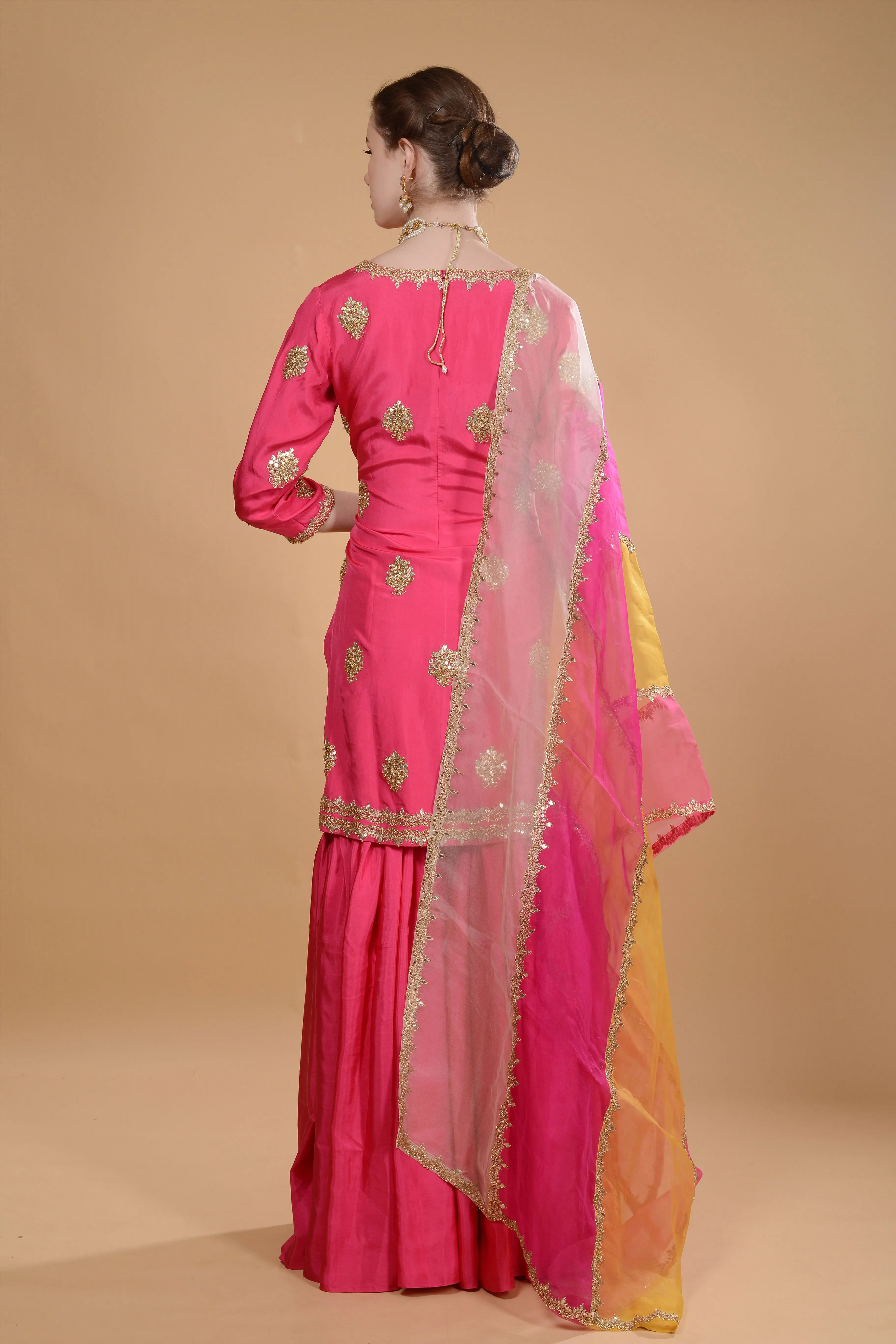 Fuchsia pink kurti and sharara set.